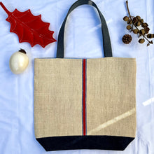 Load image into Gallery viewer, Tote bag. Vintage grain sack tote bag. Handwoven. Vertical blue and red stripes. Indigo blue denim.