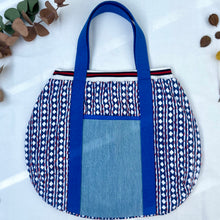 Load image into Gallery viewer, Block print bowling bag. Blue and white cotton print with red visible stitch. Red, navy blue and white knit cuff.