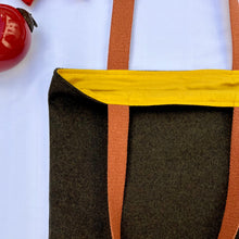 Load image into Gallery viewer, Tote bag. Luxurious dark olive green tweed wool fabric and saddle brown leather round bottom.