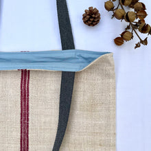 Load image into Gallery viewer, Tote bag. Vintage grain sack tote bag. Vertical burgundy stripe and indigo blue denim bottom.