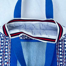 Load image into Gallery viewer, Block print bowling bag. Blue and white cotton print with red visible stitch. Red, navy blue and white knit cuff.