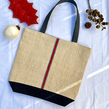 Load image into Gallery viewer, Tote bag. Vintage grain sack tote bag. Handwoven. Vertical blue and red stripes. Indigo blue denim.