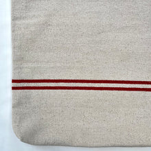 Load image into Gallery viewer, Tote bag. Heavyweight natural woven canvas with two horizontal red stripes. Lined with an ex-designer striped cotton shirting fabric.