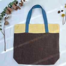 Load image into Gallery viewer, Tote bag. 100% linen tote bag. Stonewashed yellow and brown linen. Lined with an ex designer linen fabric.