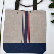 Load image into Gallery viewer, Tote bag. Vintage cotton and hemp grain sack. Blue and red stripes. Blue denim bottom.