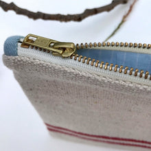 Load image into Gallery viewer, Natural woven canvas pouch with red horizontal stripes. Zippered purse. Zippered pouch. YKK metal zipper.