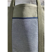 Load image into Gallery viewer, Tote bag. light khaki green canvas shopper bag with a deep front navy blue stripes denim pocket. 100% cotton.