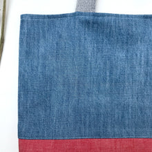 Load image into Gallery viewer, Handbag. Light blue denim and red denim handbag.