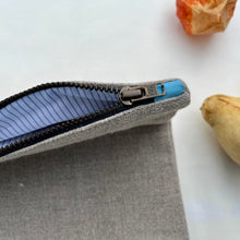 Load image into Gallery viewer, "Bon appetit" French linen and light blue denim fabric pouch. Zippered purse. Zippered pouch. YKK metal zipper.