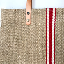 Load image into Gallery viewer, Tote bag. Vintage grain sack tote bag with brown leather straps. Handwoven. Vertical red and leather white stripes.