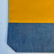 Load image into Gallery viewer, Tote bag. Canary yellow and blue denim cotton canvas tote bag. Lined with a midnight blue pattern cotton fabric.