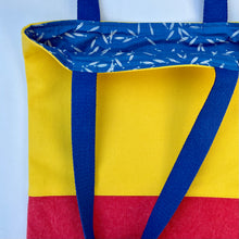 Load image into Gallery viewer, Tote bag. Vibrant yellow and red cotton canvas tote bag. Lined with a royal blue pattern cotton fabric.