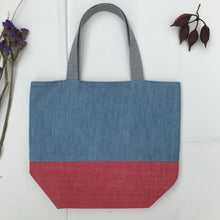 Load image into Gallery viewer, Handbag. Light blue denim and red denim handbag.