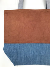 Load image into Gallery viewer, Handbag. Bag. Ex designer rust cotton canvas fabric and light blue denim handbag.