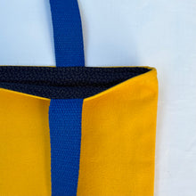 Load image into Gallery viewer, Tote bag. Canary yellow and blue denim cotton canvas tote bag. Lined with a midnight blue pattern cotton fabric.