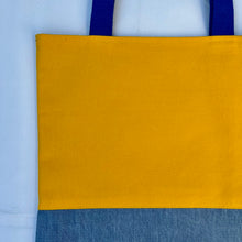Load image into Gallery viewer, Tote bag. Canary yellow and blue denim cotton canvas tote bag. Lined with a midnight blue pattern cotton fabric.