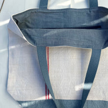 Load image into Gallery viewer, Tote Bag. Vintage French linen fabric with a light blue denim bottom.
