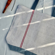 Load image into Gallery viewer, Tote Bag. Vintage French linen fabric with a light blue denim bottom.