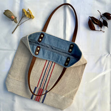 Load image into Gallery viewer, Tote bag. Vintage grain sack tote bag with leather straps. Vertical deep red stripes.