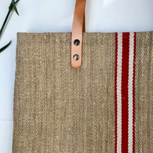 Load image into Gallery viewer, Tote bag. Vintage grain sack tote bag with brown leather straps. Handwoven. Vertical red and leather white stripes.