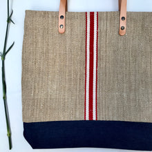 Load image into Gallery viewer, Tote bag. Vintage grain sack tote bag with brown leather straps. Handwoven. Vertical red and leather white stripes.