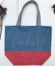 Load image into Gallery viewer, Handbag. Light blue denim and red denim handbag.