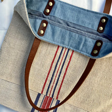 Load image into Gallery viewer, Tote bag. Vintage grain sack tote bag with leather straps. Vertical deep red stripes.