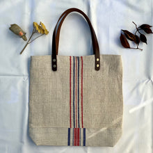 Load image into Gallery viewer, Tote bag. Vintage grain sack tote bag with leather straps. Vertical deep red stripes.