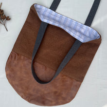 Load image into Gallery viewer, Tote bag. Luxurious brown wool fabric and distressed brown leather round bottom.
