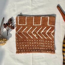 Load image into Gallery viewer, Brown Mudcloth fabric and leather pouch. 2-material Pouch with YKK zip. Zippered purse. Zippered pouch.
