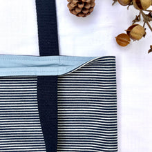 Load image into Gallery viewer, One of a kind bag. Tote Bag. Navy blue and white stripe cotton denim with an organic orange cotton denim bottom.

