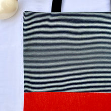 Load image into Gallery viewer, One of a kind bag. Tote Bag. Navy blue and white stripe cotton denim with an organic orange cotton denim bottom.

