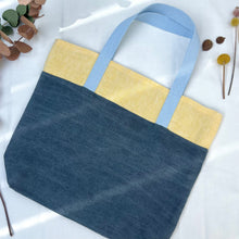 Load image into Gallery viewer, Tote bag. 100% linen tote bag. Stonewashed yellow and blue grey linen. Lined with an ex designer linen fabric.
