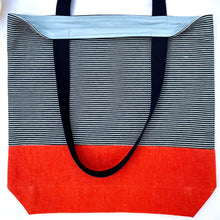 Load image into Gallery viewer, One of a kind bag. Tote Bag. Navy blue and white stripe cotton denim with an organic orange cotton denim bottom.
