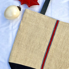 Load image into Gallery viewer, Tote bag. Vintage grain sack tote bag. Handwoven. Vertical blue and red stripes. Indigo blue denim.
