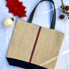 Load image into Gallery viewer, Tote bag. Vintage grain sack tote bag. Handwoven. Vertical blue and red stripes. Indigo blue denim.
