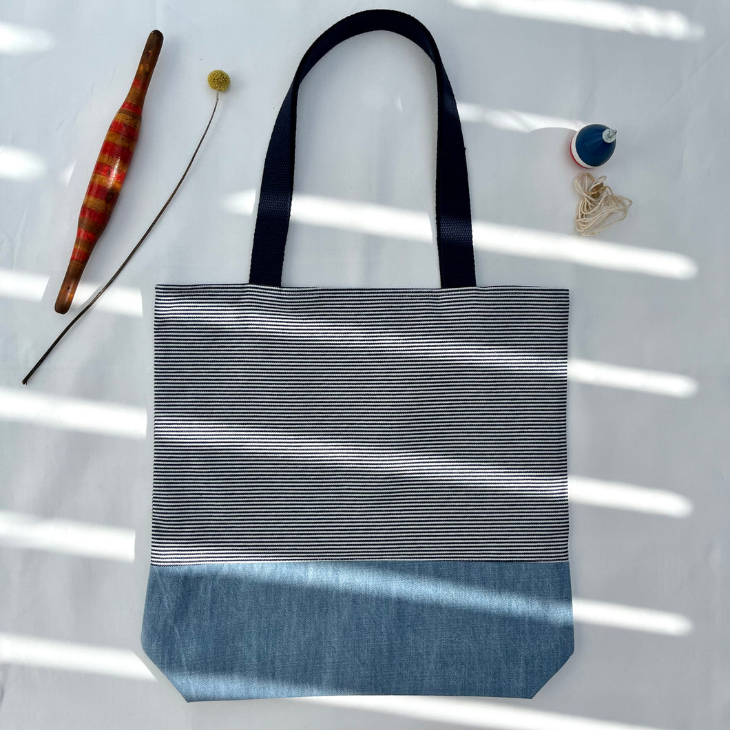 One of a kind bag. Tote Bag. Striped blue and white cotton denim with a dark blue denim bottom.
