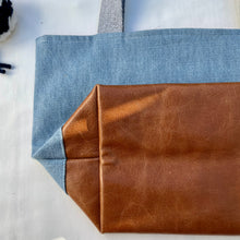 Load image into Gallery viewer, xs Handbag. Bag. Light blue cotton denim and brown leather handbag.
