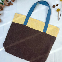 Load image into Gallery viewer, Tote bag. 100% linen tote bag. Stonewashed yellow and brown linen. Lined with an ex designer linen fabric.
