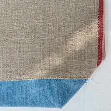 Load image into Gallery viewer, XL Tote Bag. Natural French linen fabric with raspberry red stripes and a light blue denim bottom.
