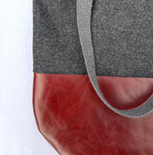 Load image into Gallery viewer, Tote bag. Luxurious grey tweed wool fabric and burgundy leather round bottom.
