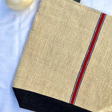Load image into Gallery viewer, Tote bag. Vintage grain sack tote bag. Handwoven. Vertical blue and red stripes. Indigo blue denim.
