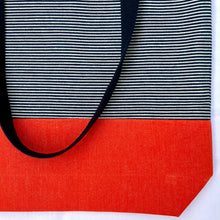 Load image into Gallery viewer, One of a kind bag. Tote Bag. Navy blue and white stripe cotton denim with an organic orange cotton denim bottom.
