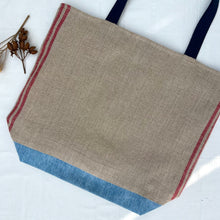 Load image into Gallery viewer, XL Tote Bag. Natural French linen fabric with raspberry red stripes and a light blue denim bottom.
