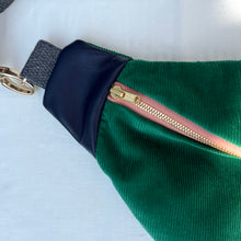 Load image into Gallery viewer, One-of-a-kind tote sling bag. Luxurious green cotton needlecord. With navy blue leather sides. Lined with a gorgeous blue and green striped cotton poplin fabric.
