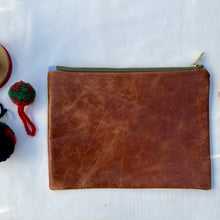 Load image into Gallery viewer, Red striped French linen and upcycled brown leather. 2-material pouch with YKK zip. Zippered purse. Zippered pouch.
