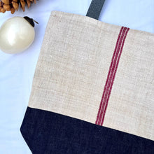 Load image into Gallery viewer, Tote bag. Vintage grain sack tote bag. Vertical burgundy stripe and indigo blue denim bottom.
