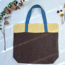 Load image into Gallery viewer, Tote bag. 100% linen tote bag. Stonewashed yellow and brown linen. Lined with an ex designer linen fabric.
