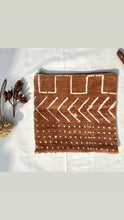 Load image into Gallery viewer, Brown Mudcloth fabric and leather pouch. 2-material Pouch with YKK zip. Zippered purse. Zippered pouch.
