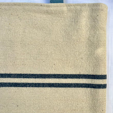 Load image into Gallery viewer, Tote bag. Heavyweight natural woven canvas with two horizontal blue stripes and light blue cotton denim bottom.
